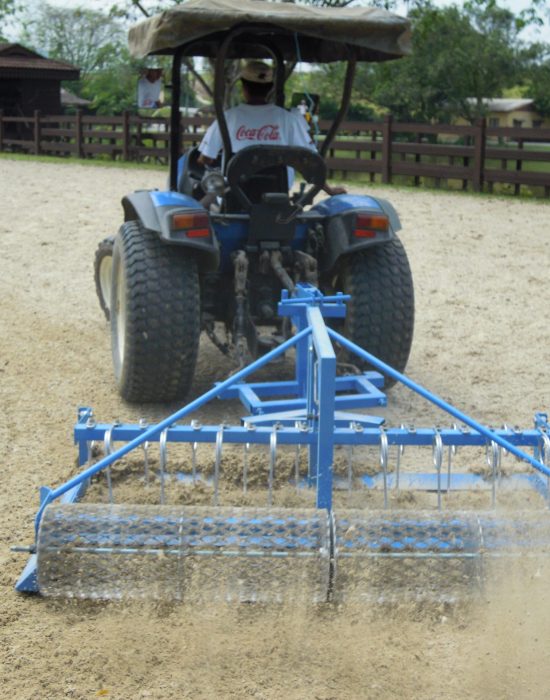 Articulated arena rake